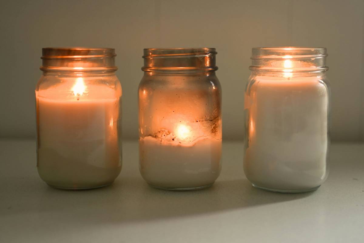 homemade scented candles diy setup with soy wax, fragrance oils, and double boiler