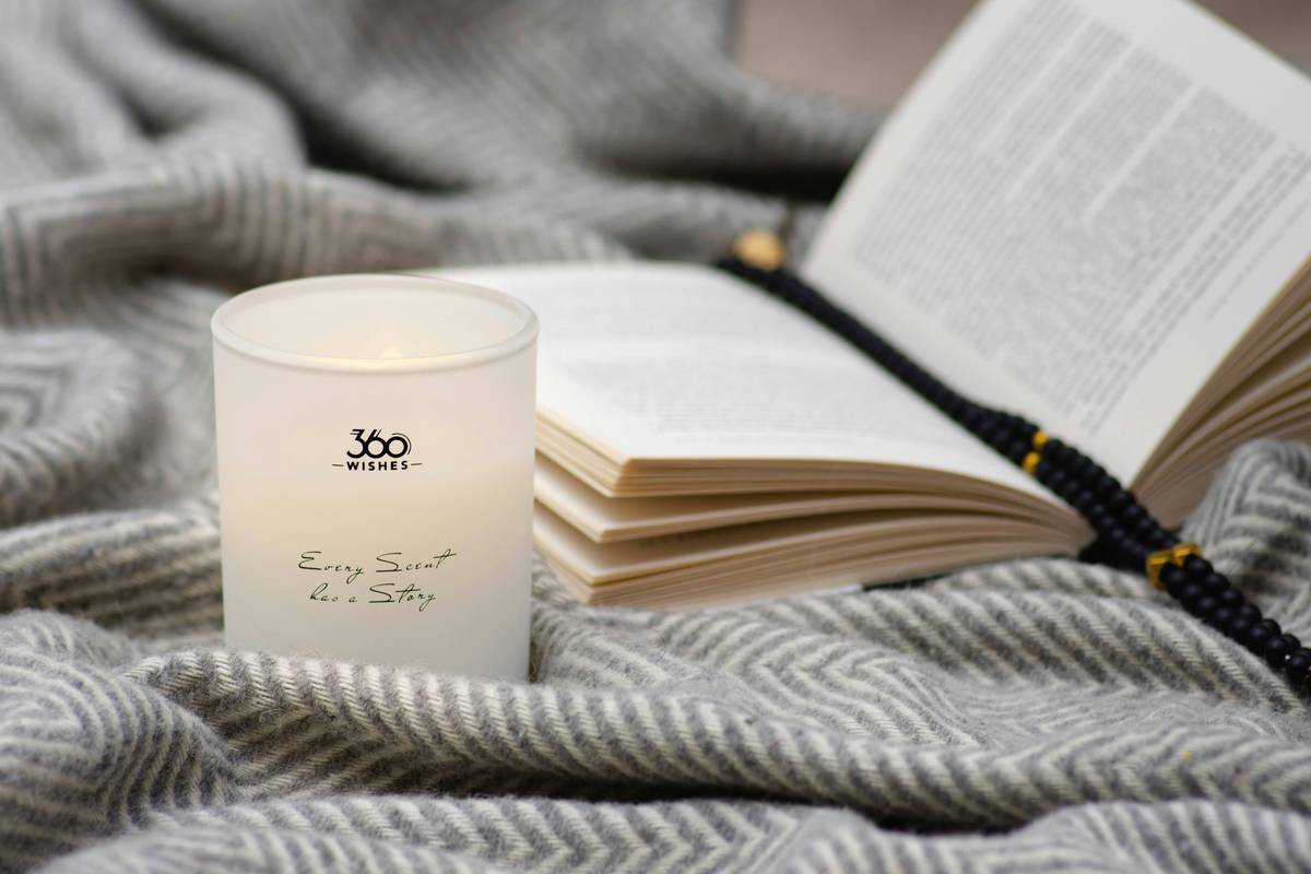 Woman using 20 minute relaxation candles during evening wind-down routine